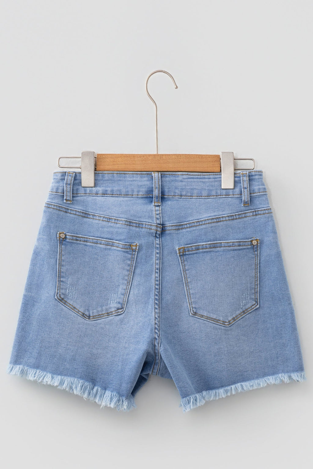 Distressed Denim Asymmetric Raw Hem Shorts