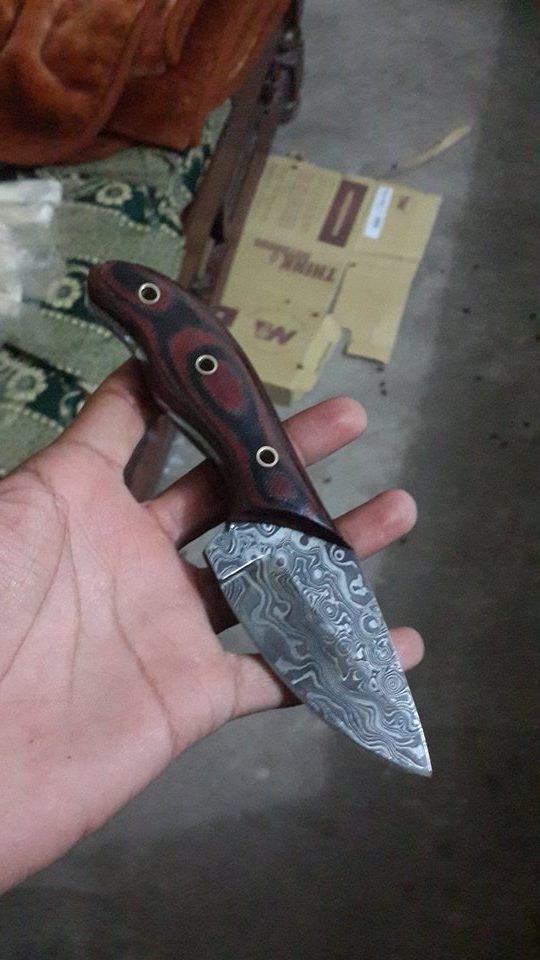 damascus rain drop pattern skinning knife