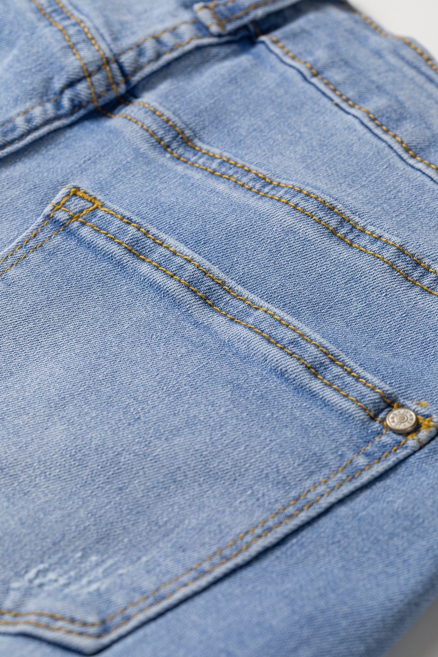 Distressed Denim Asymmetric Raw Hem Shorts