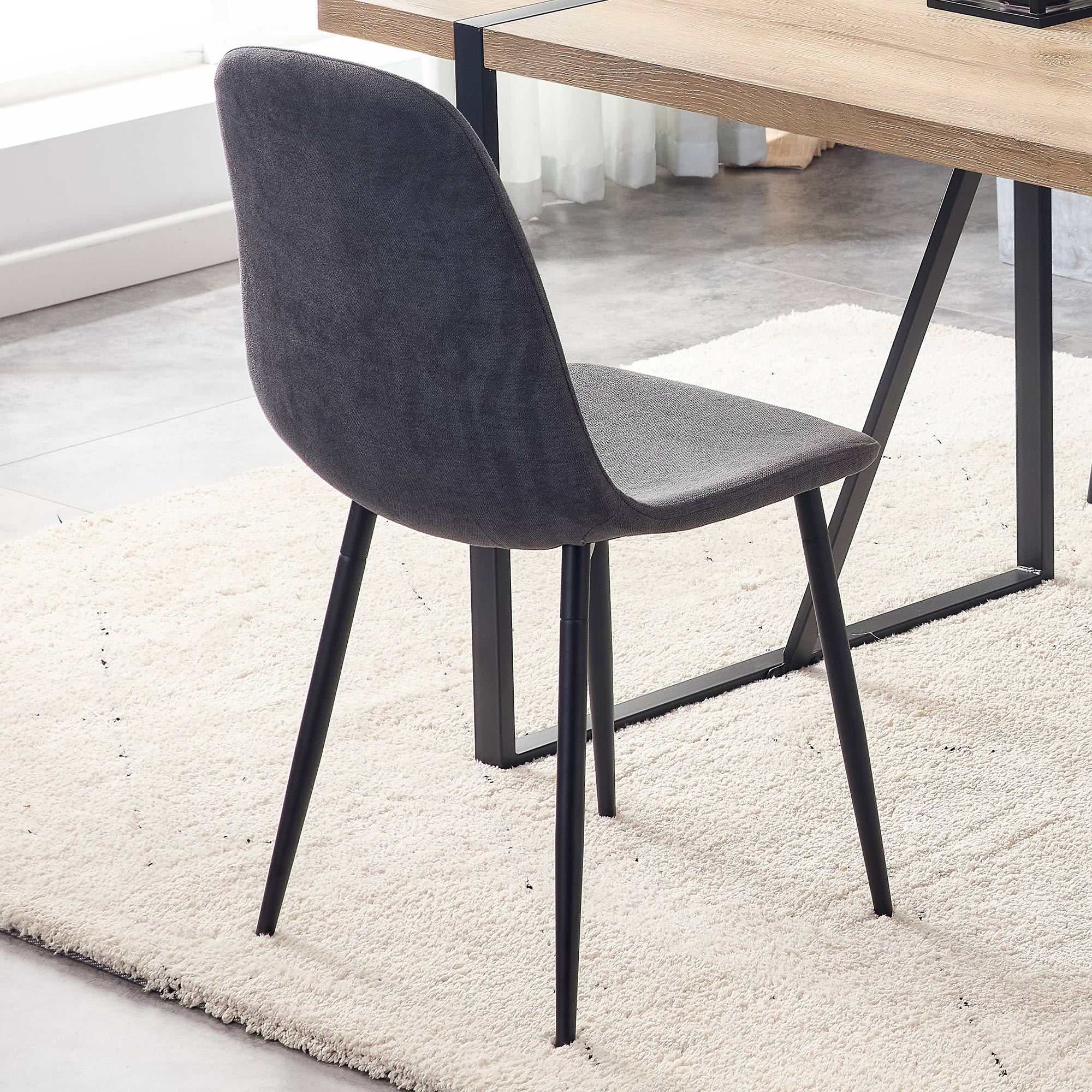 A set of 4 modern medieval style restaurant cushioned side chairs, equipped with soft cushions and black metal legs, suitable for kitchens, lounges, and farmhouses. B0501A