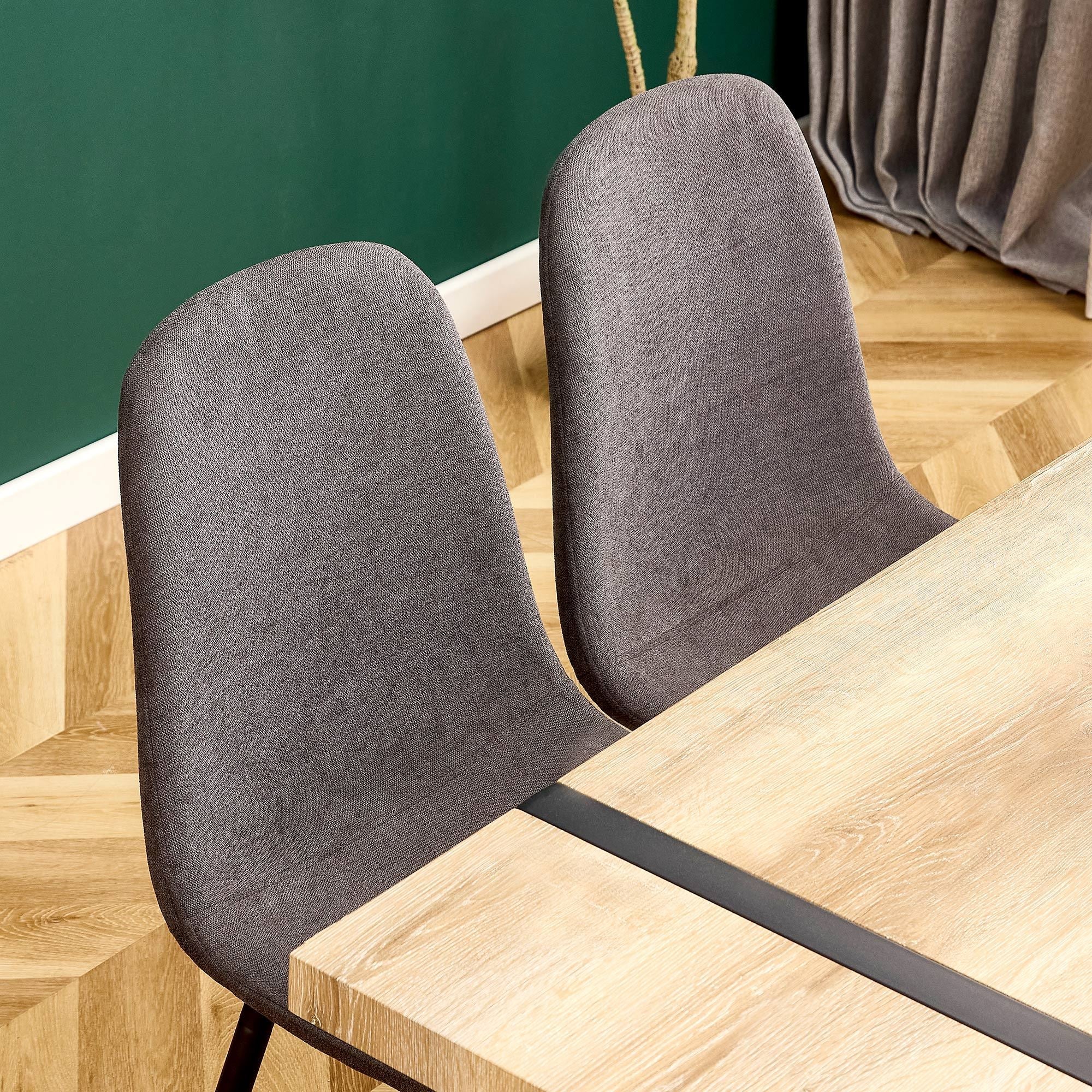 A set of 4 modern medieval style restaurant cushioned side chairs, equipped with soft cushions and black metal legs, suitable for kitchens, lounges, and farmhouses. B0501A