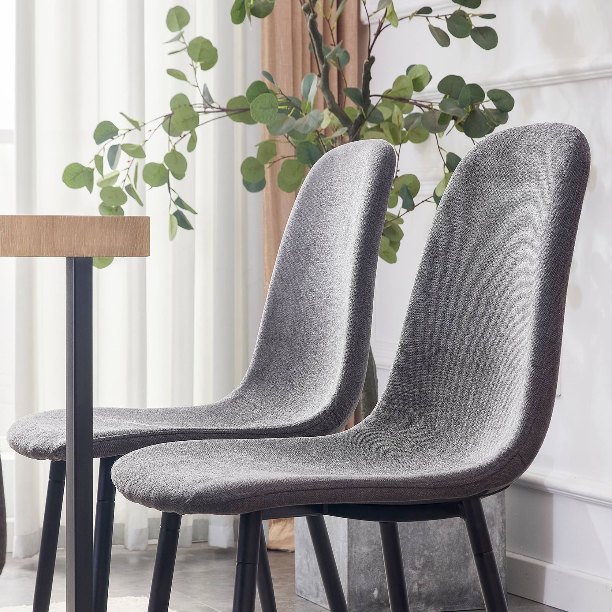 A set of 4 modern medieval style restaurant cushioned side chairs, equipped with soft cushions and black metal legs, suitable for kitchens, lounges, and farmhouses. B0501A
