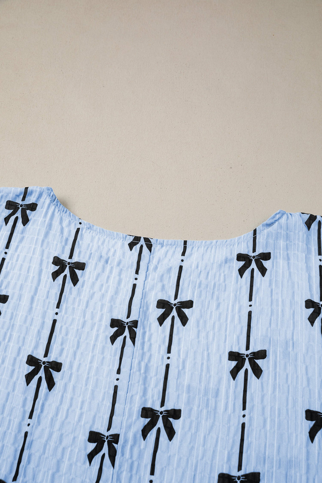 Bow Textured Short Puff Sleeve Top