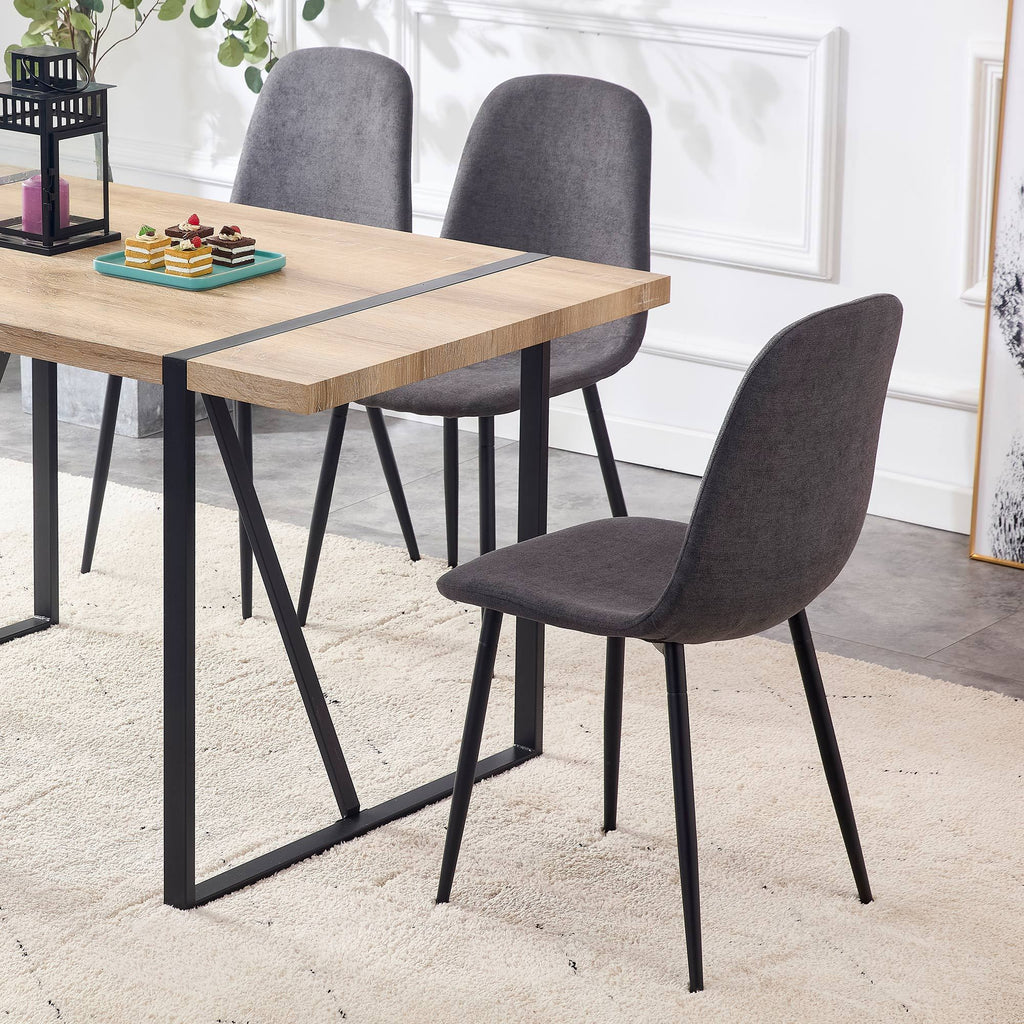 A set of 4 modern medieval style restaurant cushioned side chairs, equipped with soft cushions and black metal legs, suitable for kitchens, lounges, and farmhouses. B0501A