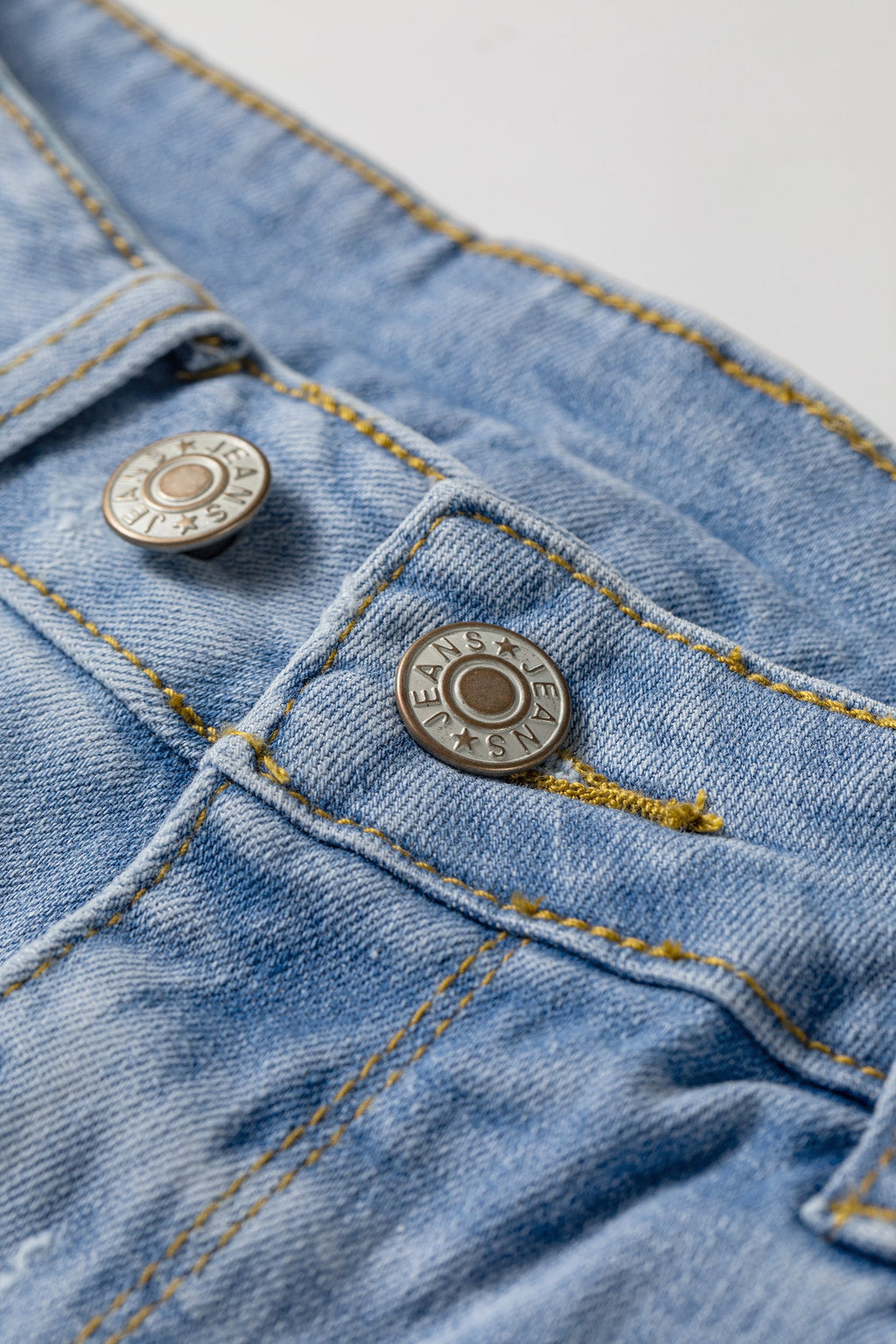 Distressed Denim Asymmetric Raw Hem Shorts