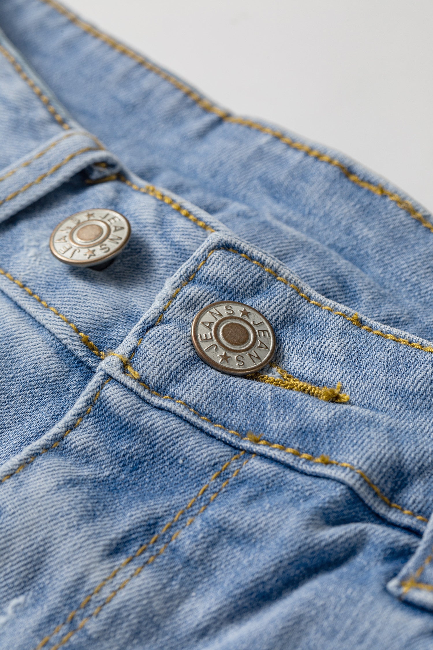 Distressed Denim Asymmetric Raw Hem Shorts