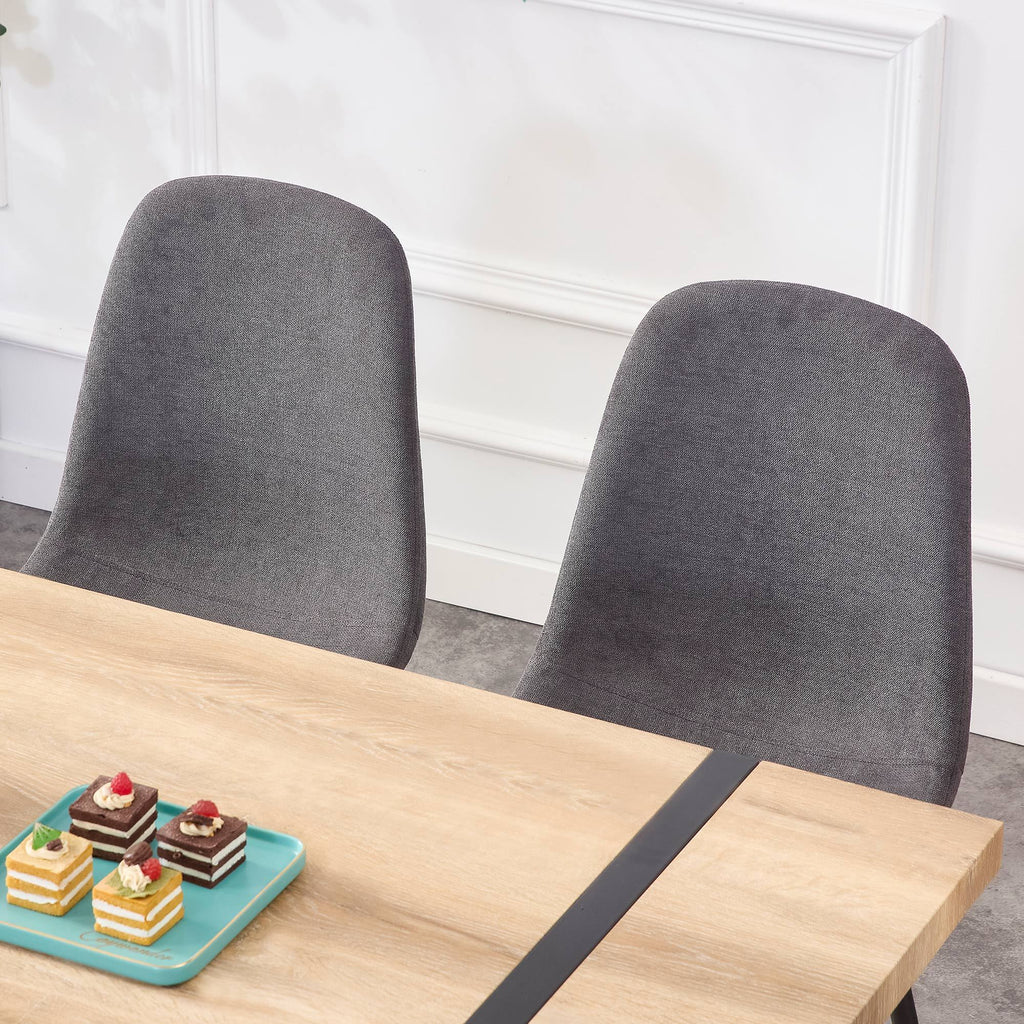 A set of 4 modern medieval style restaurant cushioned side chairs, equipped with soft cushions and black metal legs, suitable for kitchens, lounges, and farmhouses. B0501A