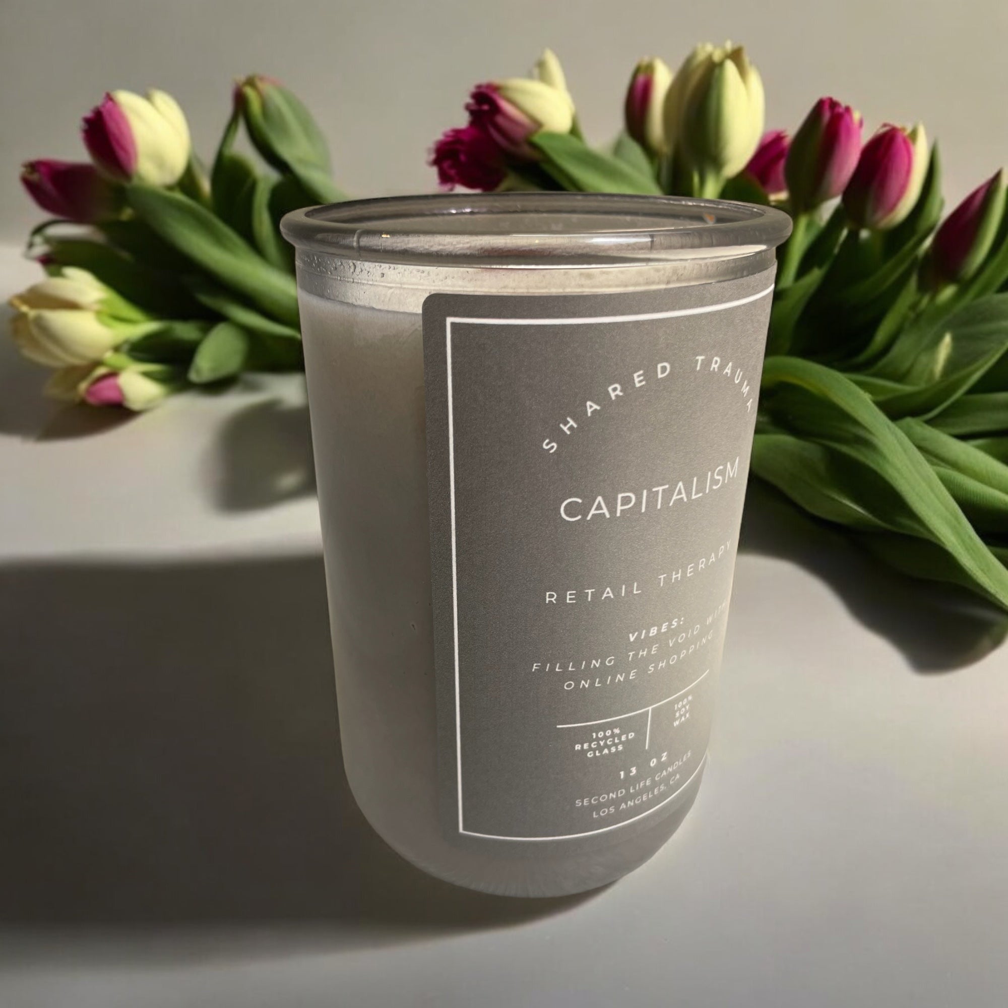 Shared Trauma Candles - Capitalism - 13 Oz Crackling Wood Wick - Tulips & Gardenia