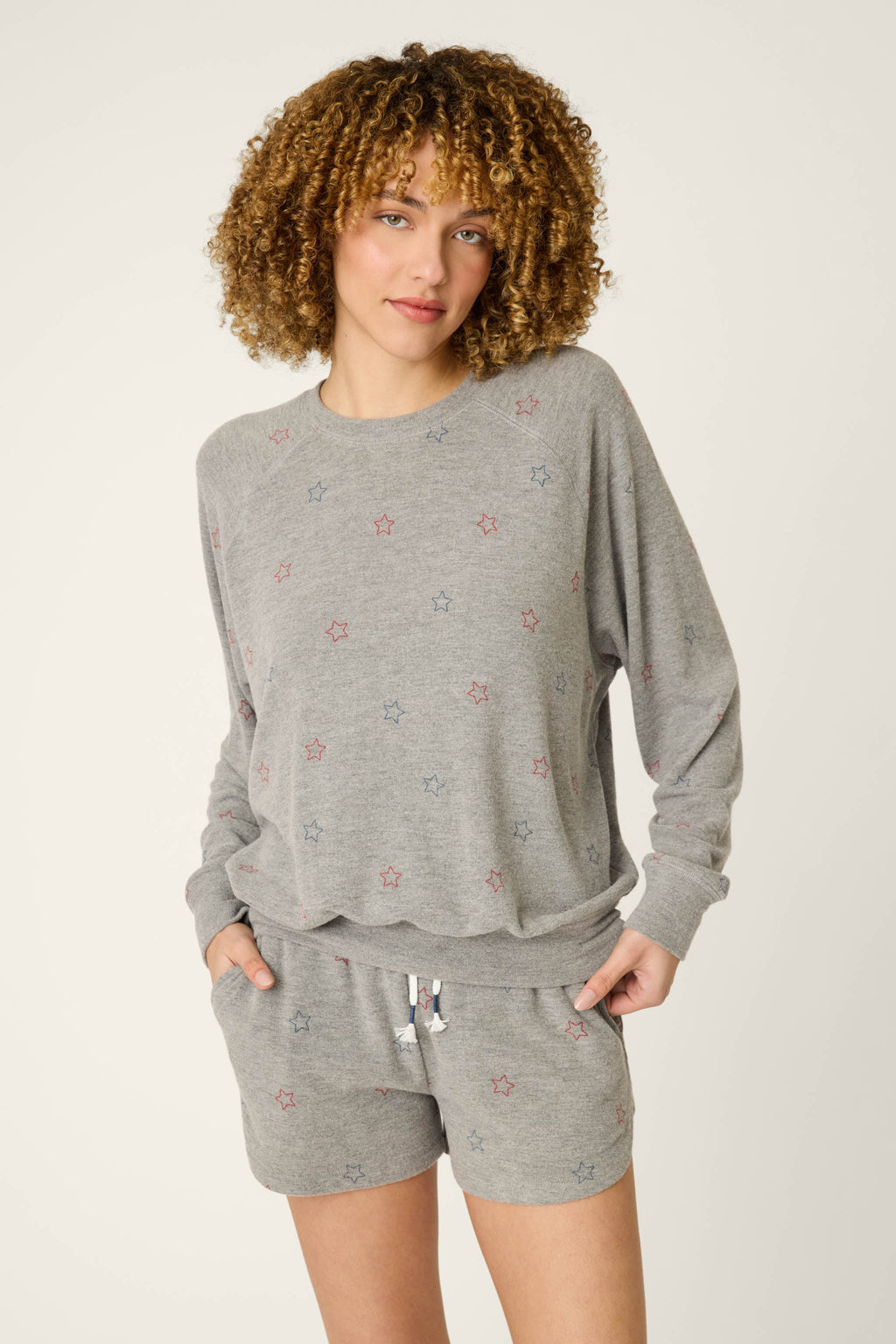 Red, White, & Woof Star Print Long Sleeve Top