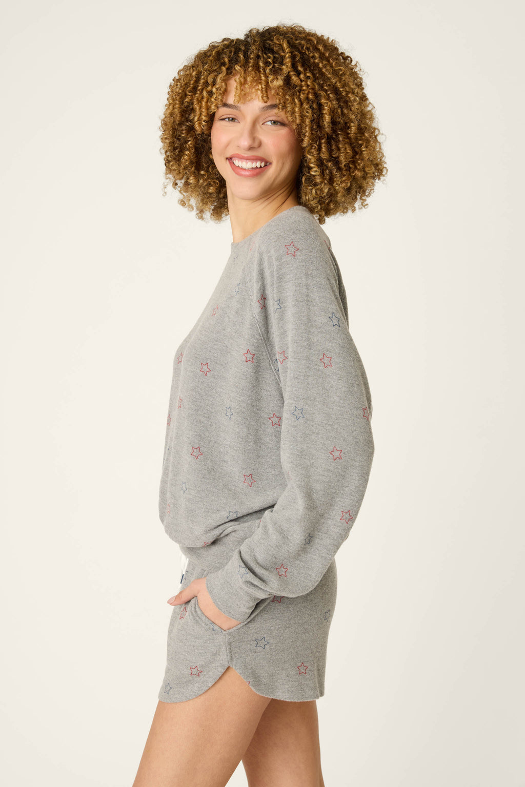 Red, White, & Woof Star Print Long Sleeve Top