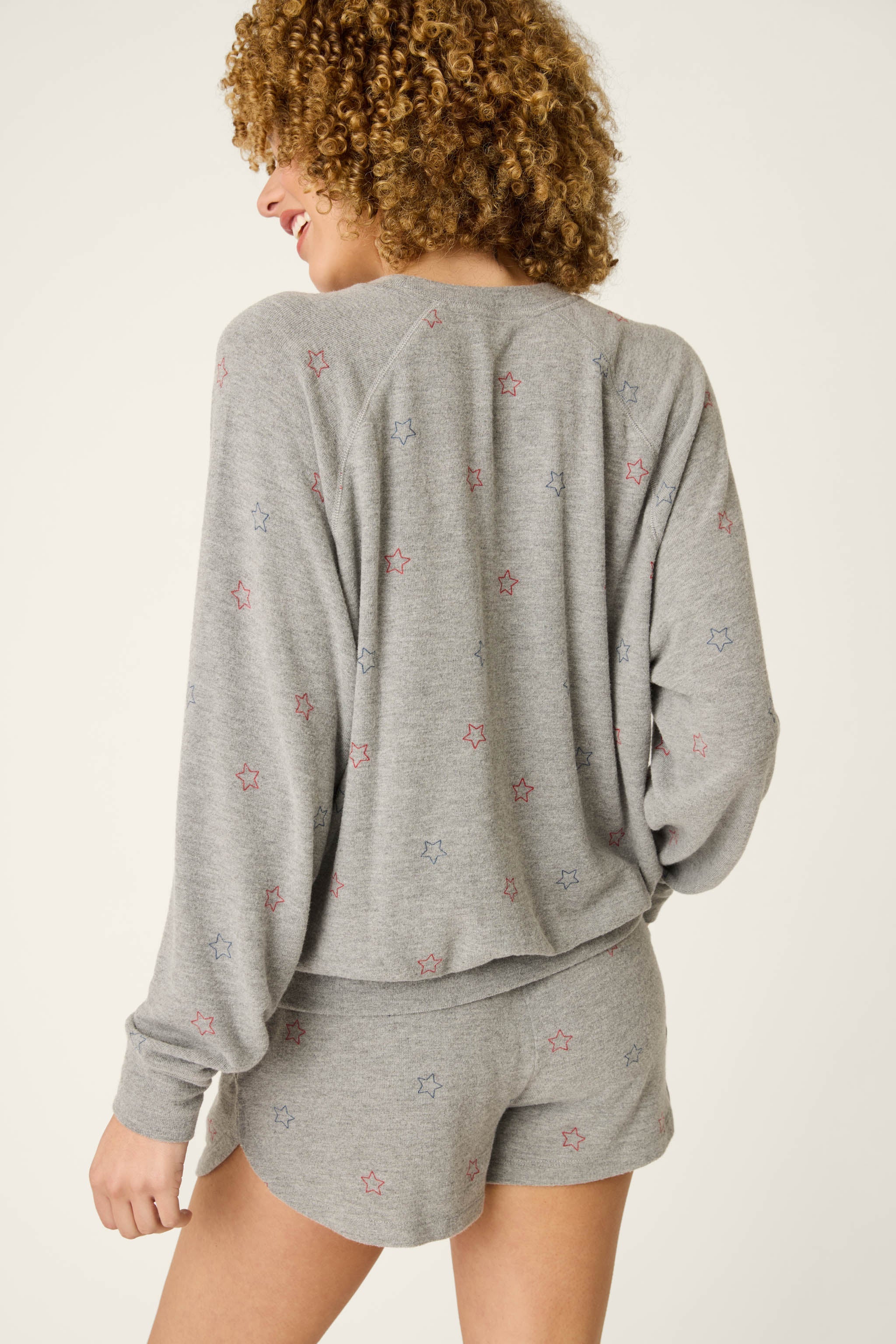 Red, White, & Woof Star Print Long Sleeve Top