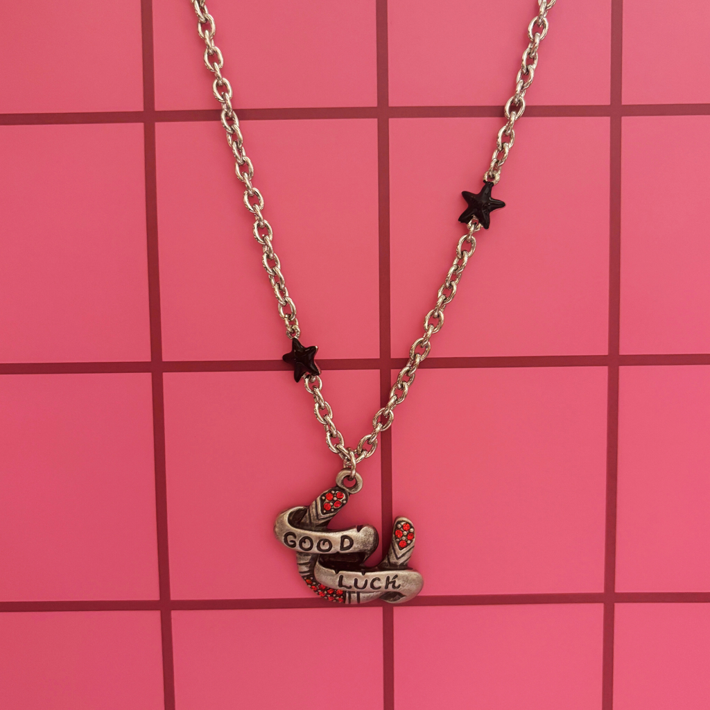 Sourpuss "Good Luck” Horseshoe Necklace with Red Rhinestones & Black Star Charms