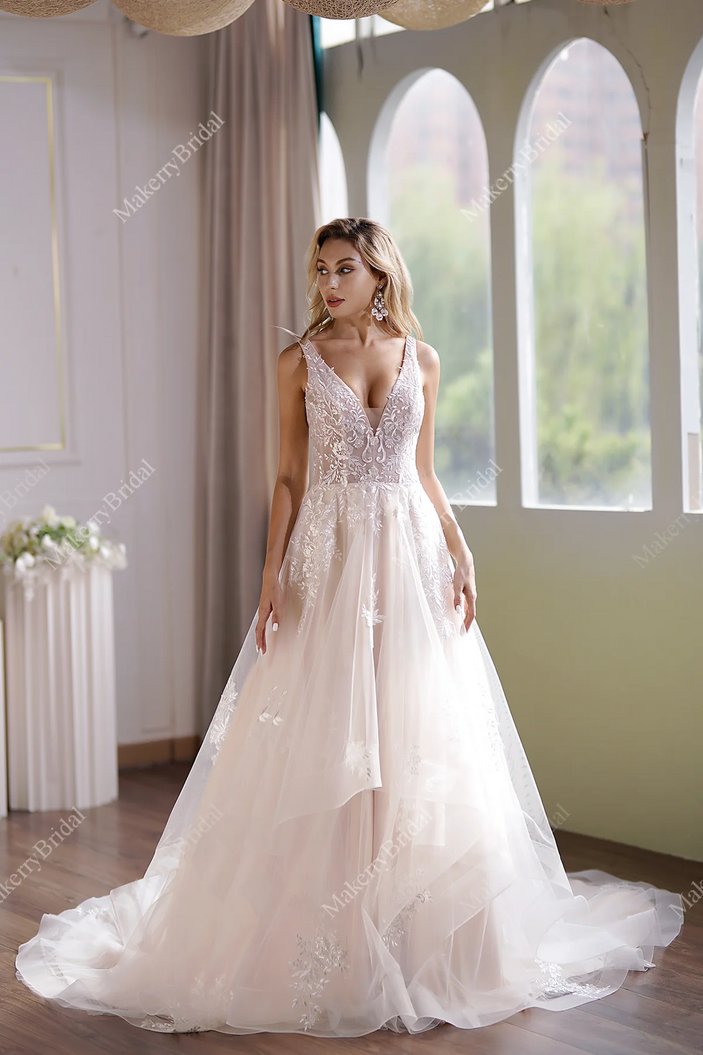 Ball Gown With A Sleeveless Bodice And A V-Neck Neckline