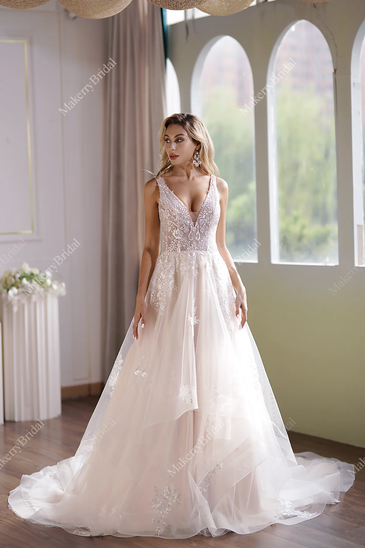 Ball Gown With A Sleeveless Bodice And A V-Neck Neckline
