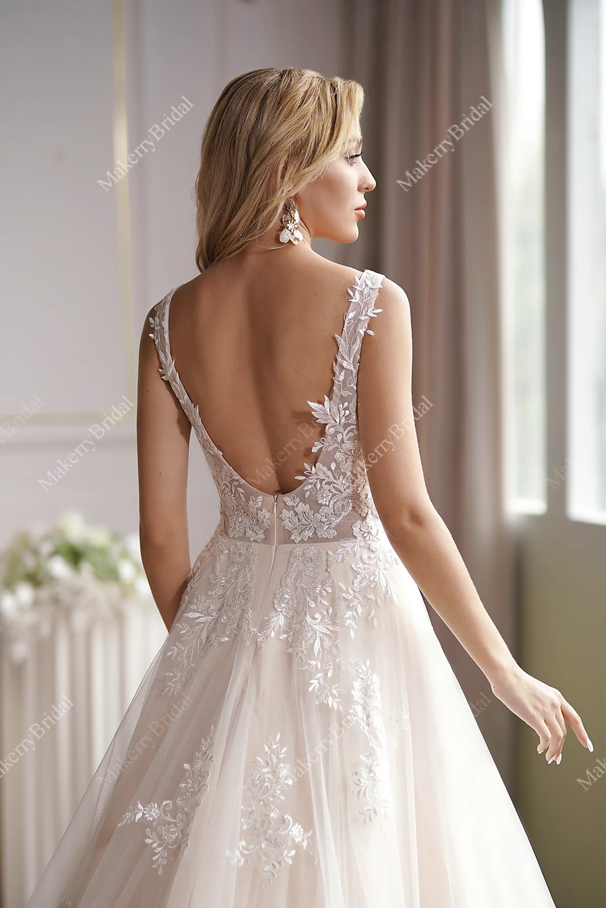 Ball Gown With A Sleeveless Bodice And A V-Neck Neckline