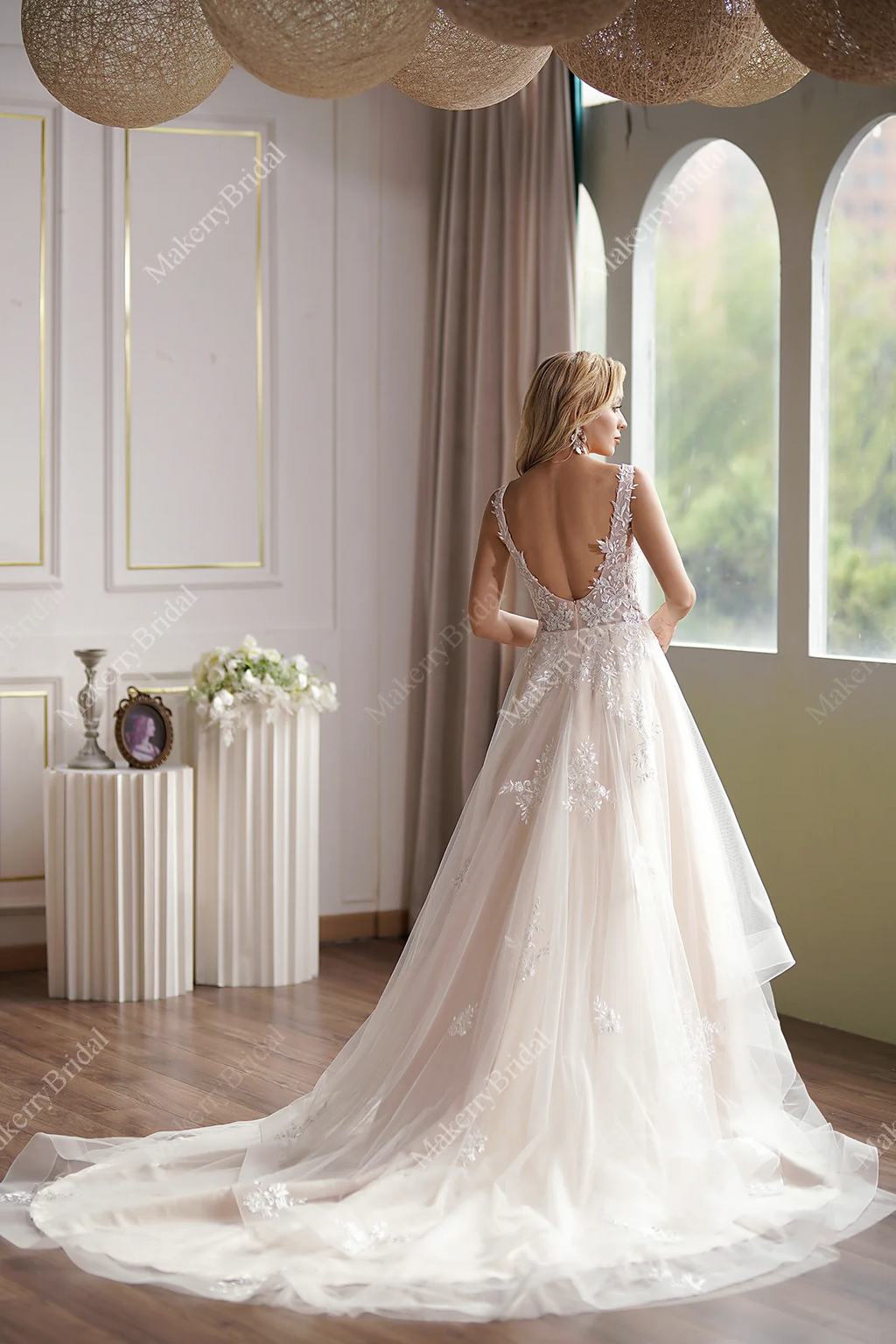 Ball Gown With A Sleeveless Bodice And A V-Neck Neckline