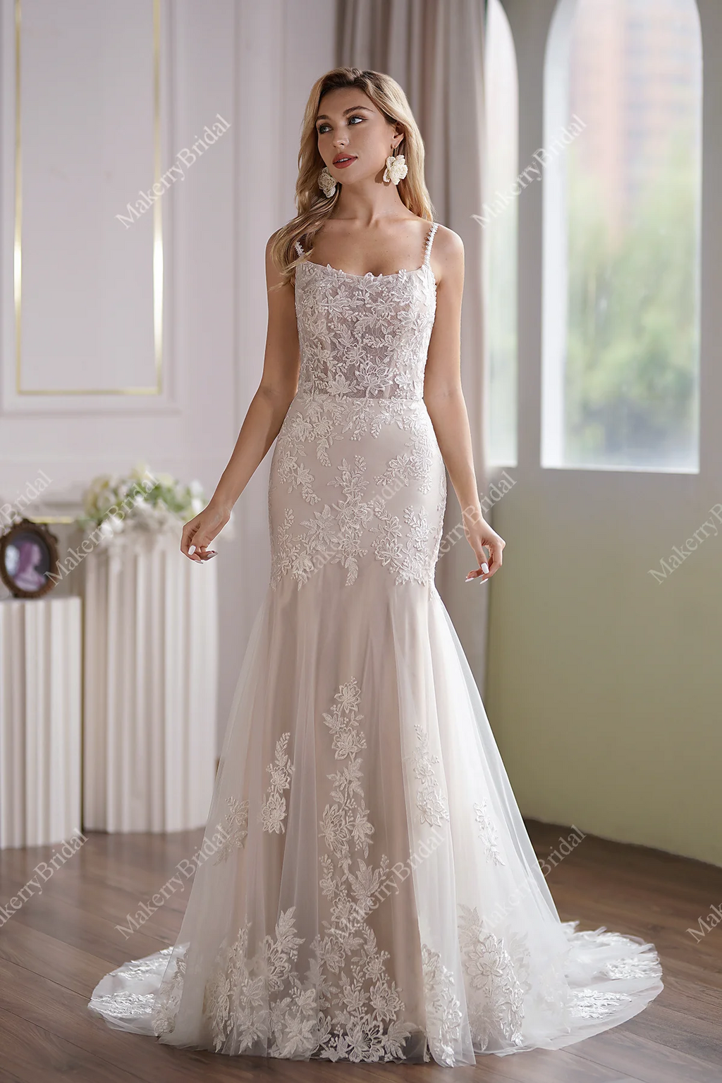 Tulle Mermaid Bridal Gown Has A Subtle Scoop Neckline And A Sheer Back