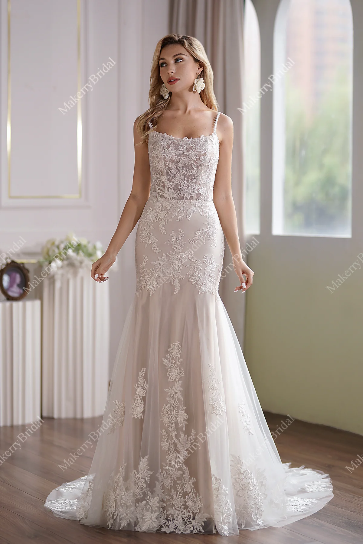 Tulle Mermaid Bridal Gown Has A Subtle Scoop Neckline And A Sheer Back
