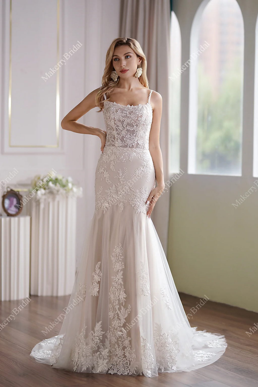 Tulle Mermaid Bridal Gown Has A Subtle Scoop Neckline And A Sheer Back
