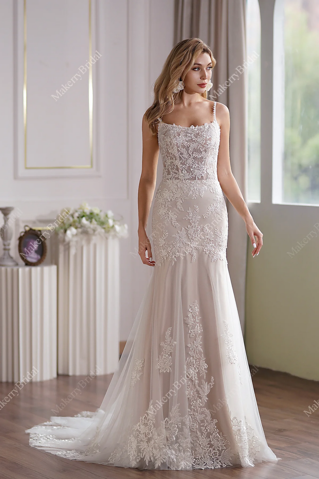 Tulle Mermaid Bridal Gown Has A Subtle Scoop Neckline And A Sheer Back