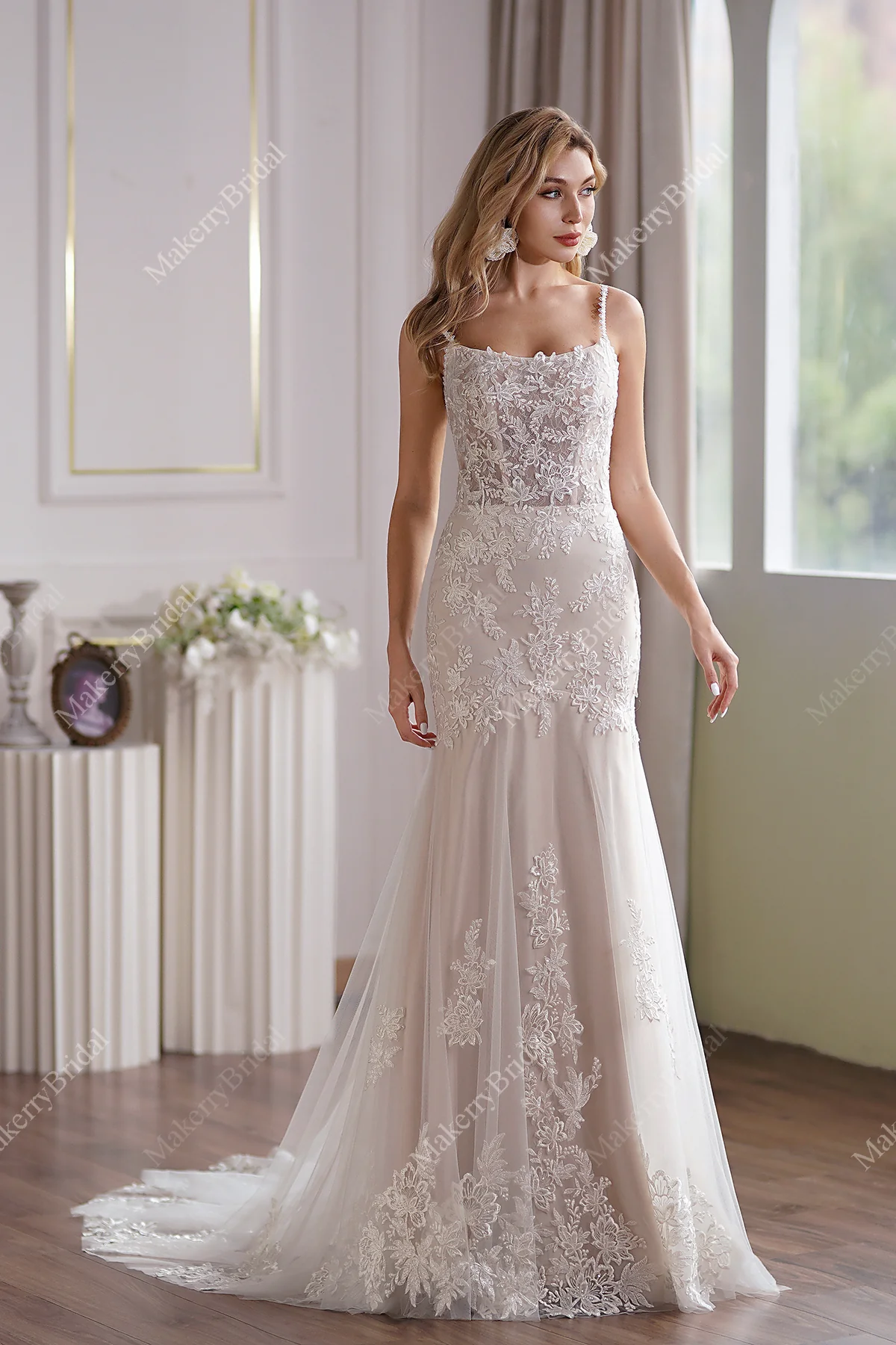 Tulle Mermaid Bridal Gown Has A Subtle Scoop Neckline And A Sheer Back