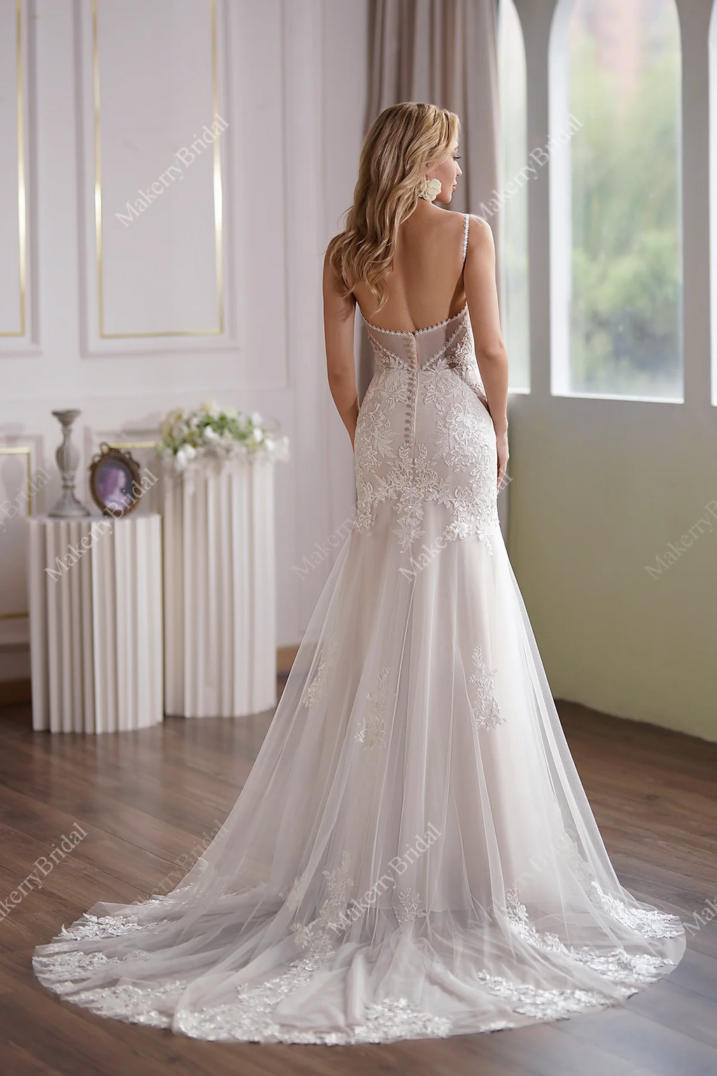 Tulle Mermaid Bridal Gown Has A Subtle Scoop Neckline And A Sheer Back