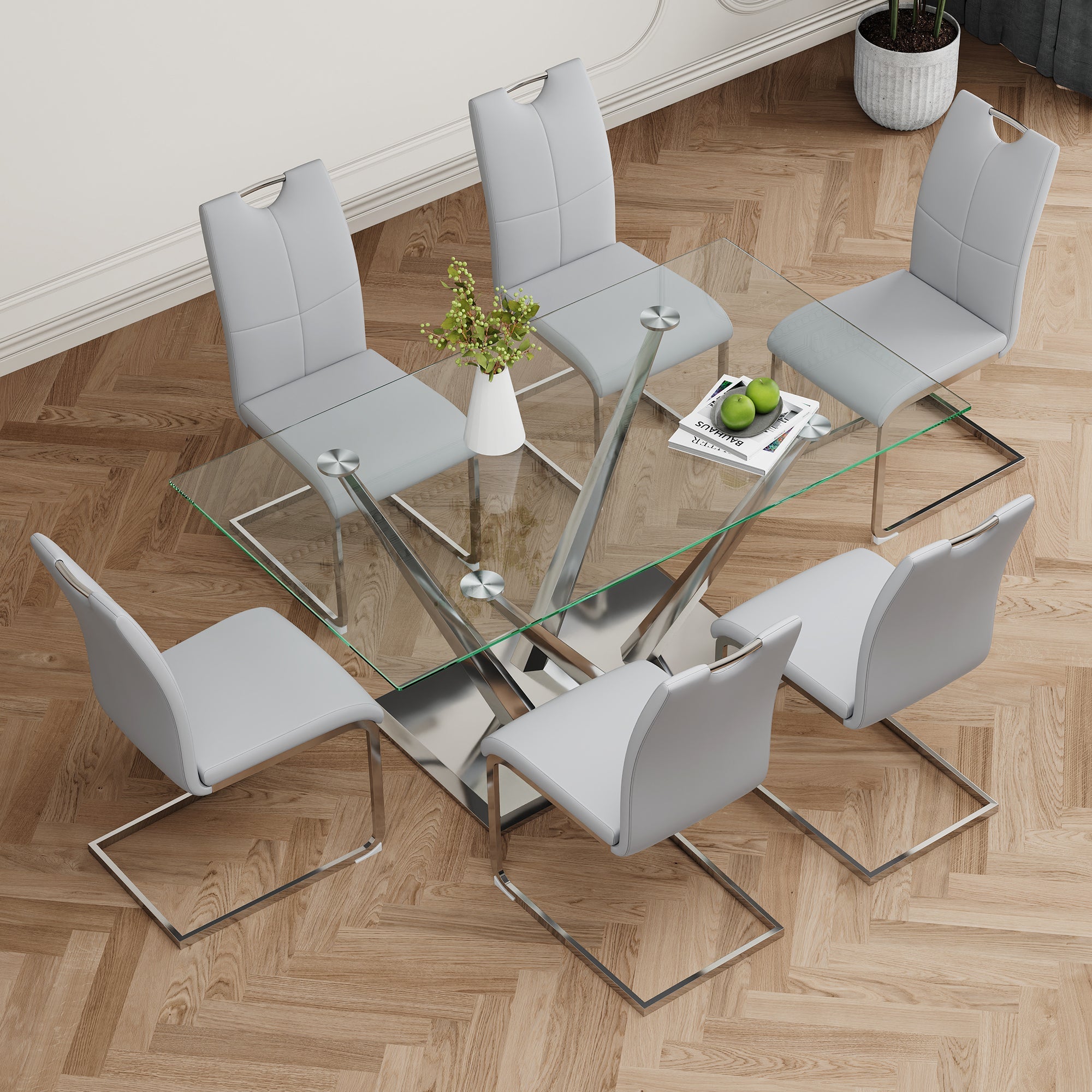 Modern style glass dining table, elegant transparent design, sturdy stainless steel base, Light gray dining chairs set, electroplated chair legs, suitable for dining room and kitchen (set of 7)