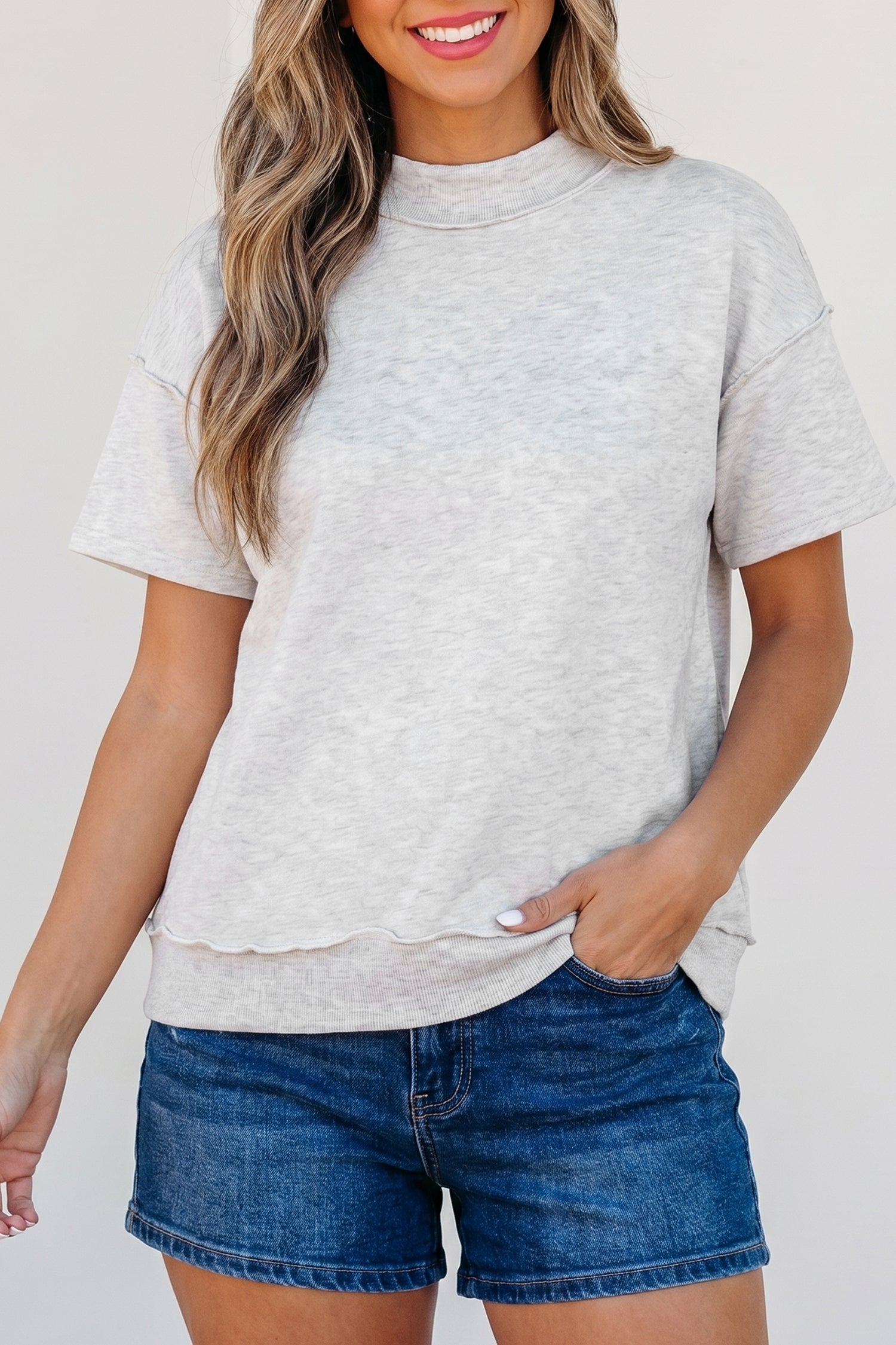 Solid Exposed Seam Mock Neck Tee