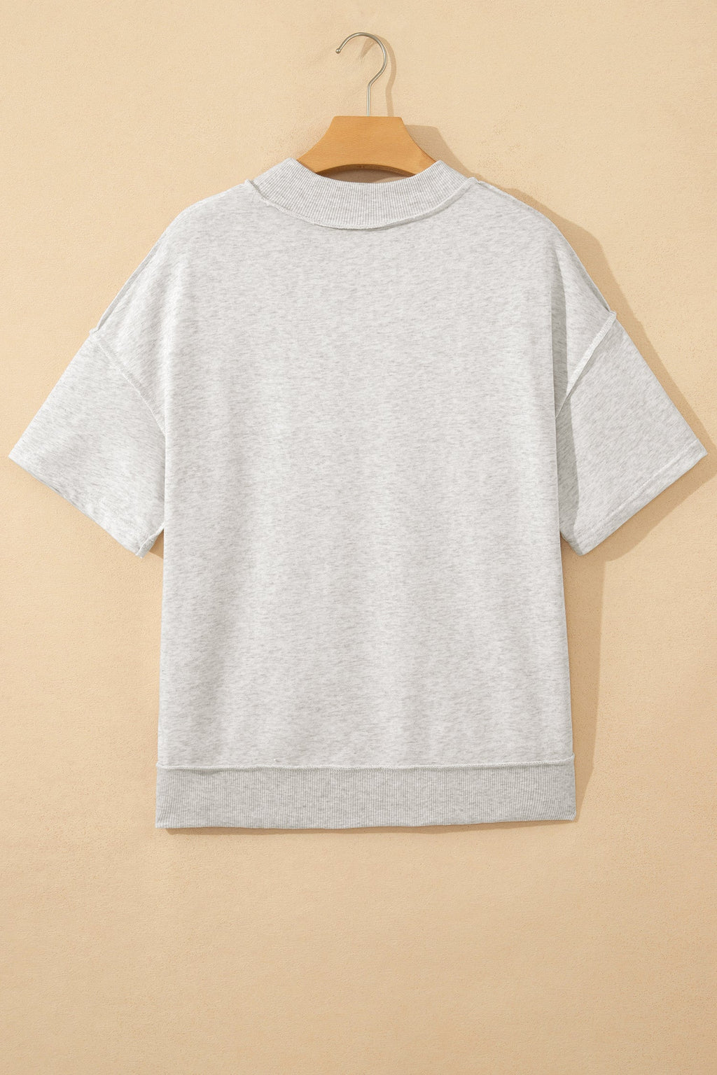Solid Exposed Seam Mock Neck Tee