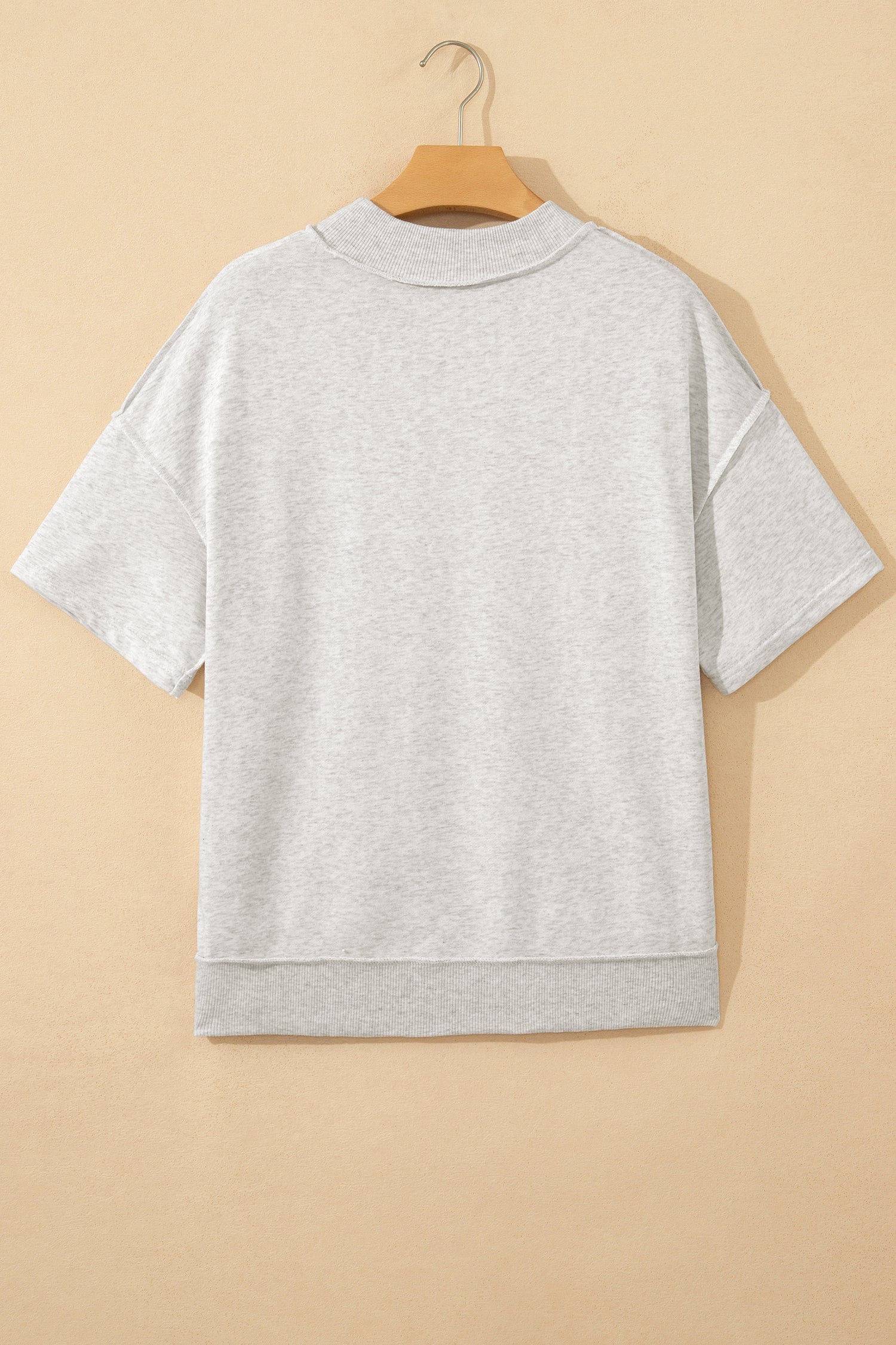 Solid Exposed Seam Mock Neck Tee