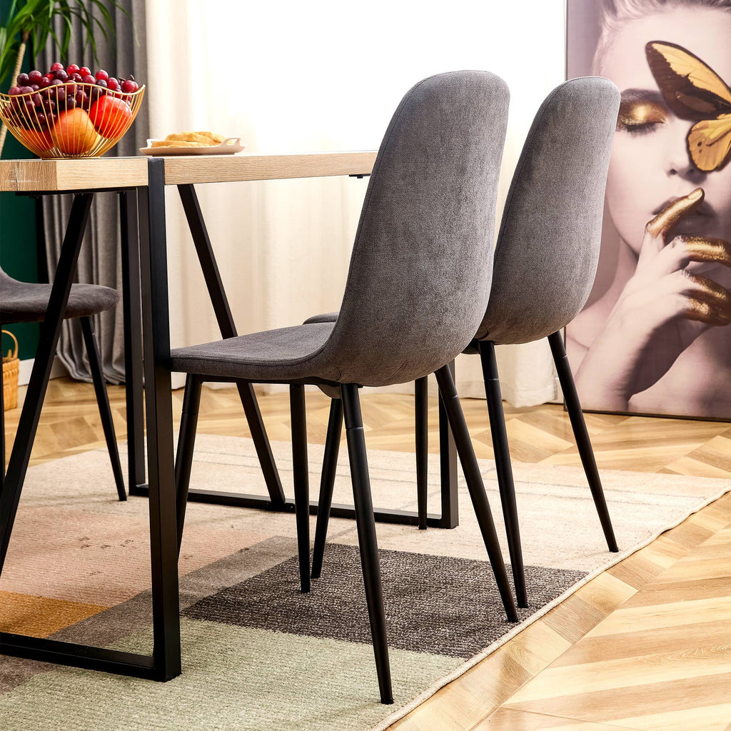 A set of 4 modern medieval style restaurant cushioned side chairs, equipped with soft cushions and black metal legs, suitable for kitchens, lounges, and farmhouses. B0501A