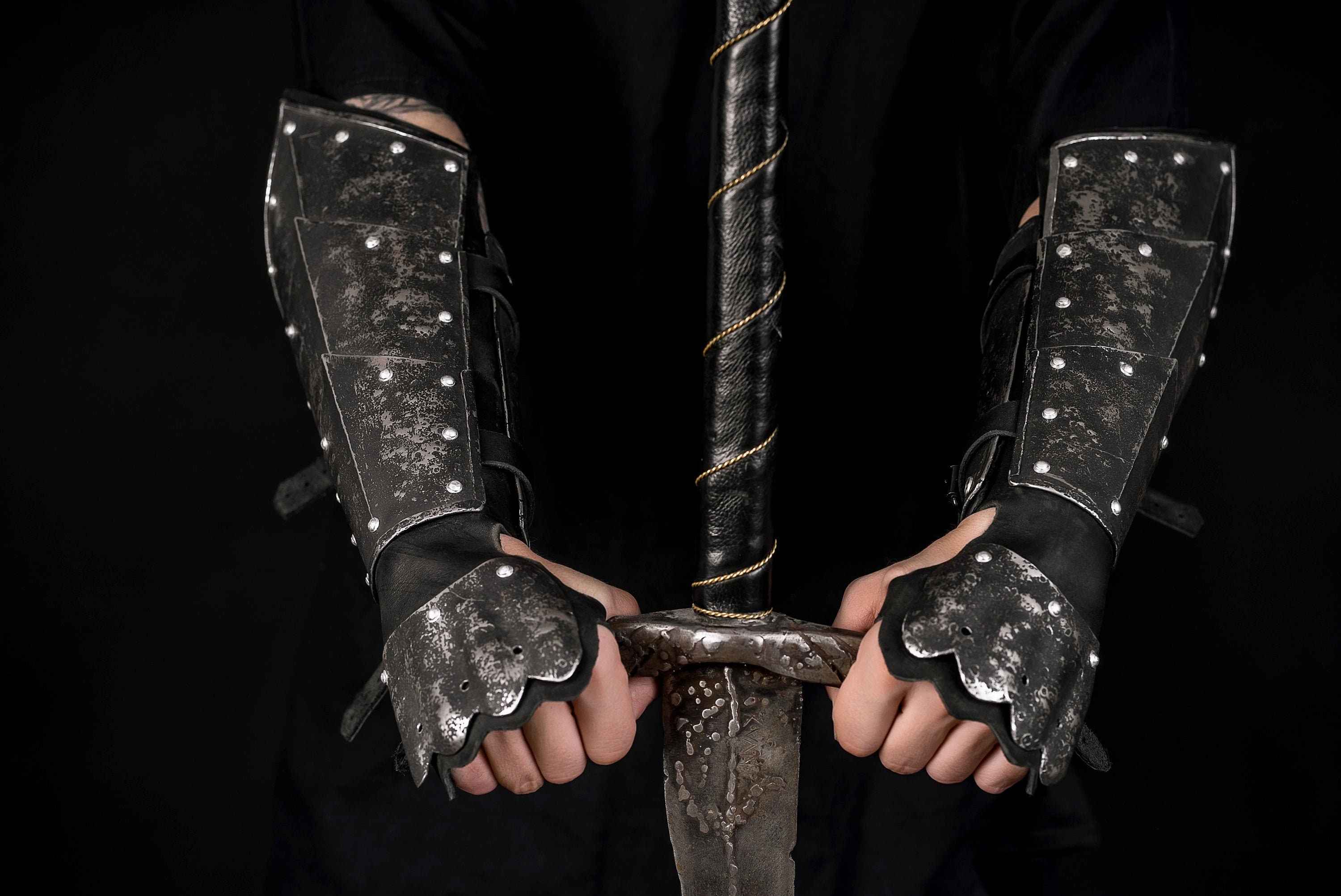 Medieval leather bracers with hand protection