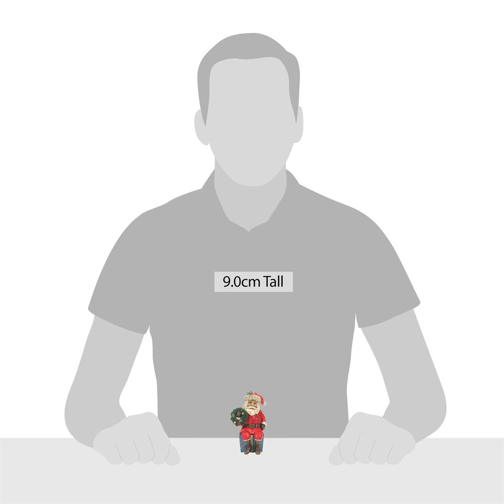 Santa Sitting on Gifts